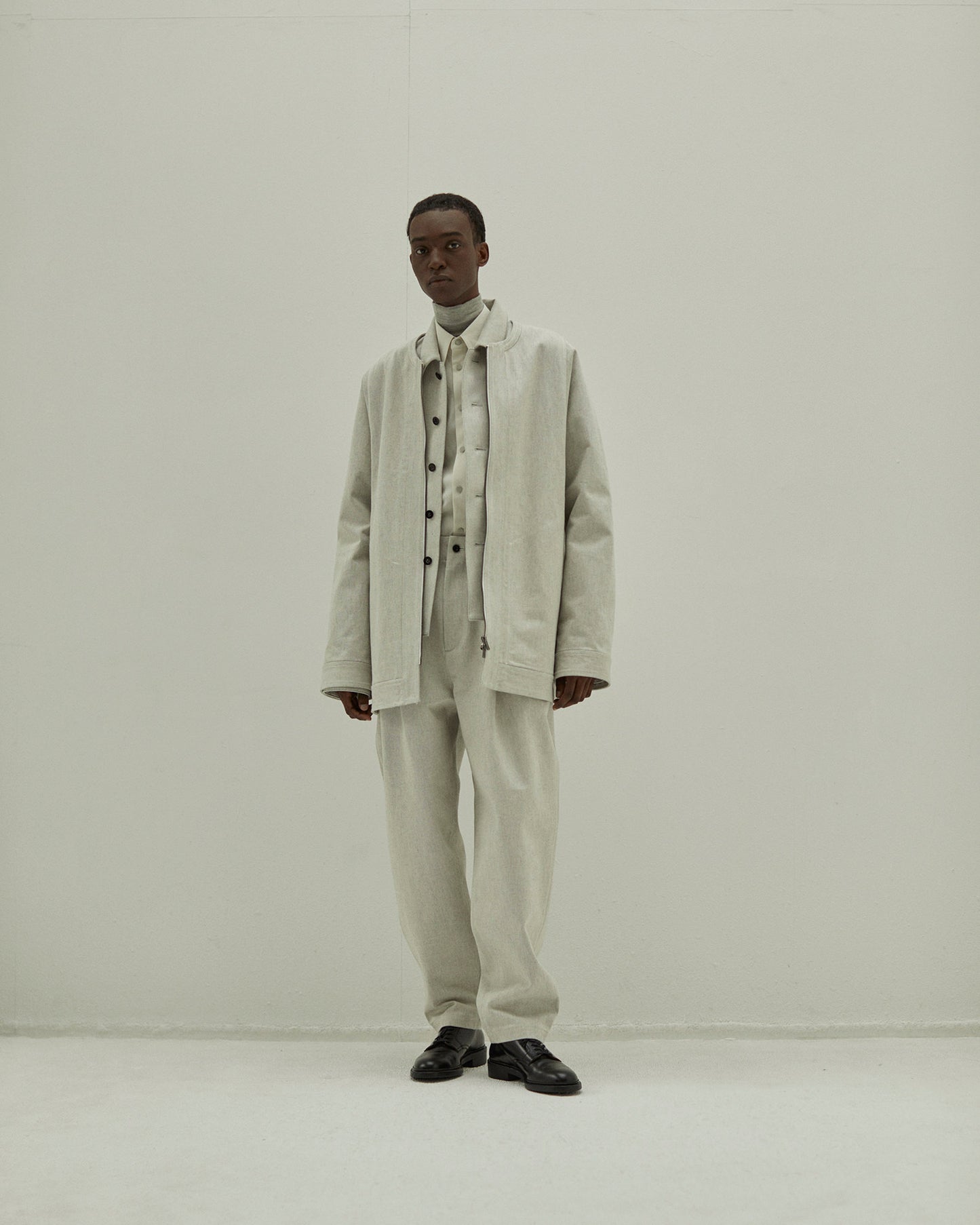 THREE TUCKS TAPERED PANTS